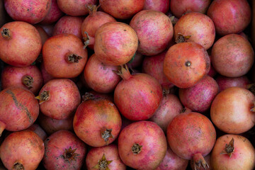 A background of fresh pomegranates in perfect details. 