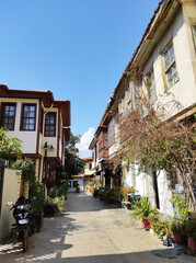 Old town street with houses with stone facades