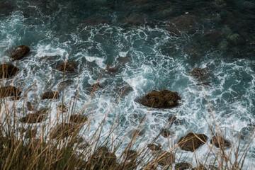 Breathtaking view of the wavy Atlantic ocean from the cliff in Azores islands Portugal