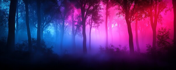 Naklejka premium Mysterious forest with colorful fog in shades of blue and pink.