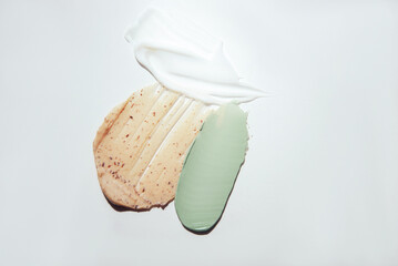 Cosmetic samples texture. Multicolored smears on a white background