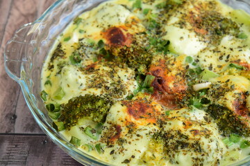 Broccoli casserole with mozzarella, spring onion and paprika powder