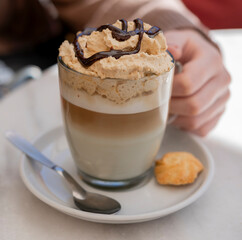 Coffee with cream and chocolate syrup