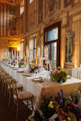 Modern luxury destination wedding decor in dark gold mode in historical Italian villa Arvedi with...
