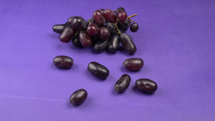 Natural organic different types of fresh ripe juicy grapes and space for text on table. top view, Agriculture concepts.