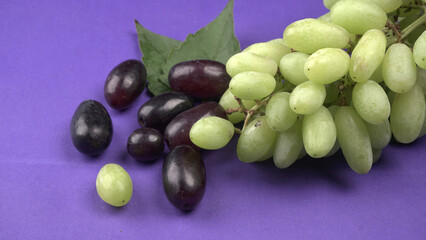 Natural organic different types of fresh ripe juicy grapes and space for text on table. top view, Agriculture concepts.