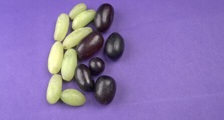 Natural organic different types of fresh ripe juicy grapes and space for text on table. top view, Agriculture concepts.