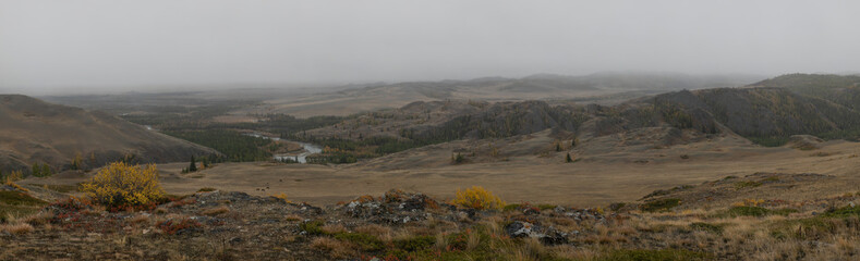 Glued high-resolution panorama of Kurai steppe in Altai. Autumn golden wide format  landscape of an...