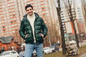 Photo of cheerful handsome man wearing trendy clothes cold autumn season weather outdoors © deagreez