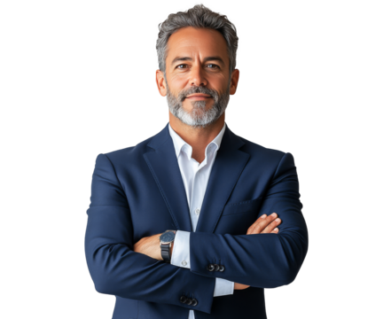 Confident businessman in a tailored suit standing with arms crossed against a plain backdrop