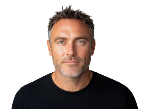 Portrait of a smiling man with short hair and blue eyes against a neutral background