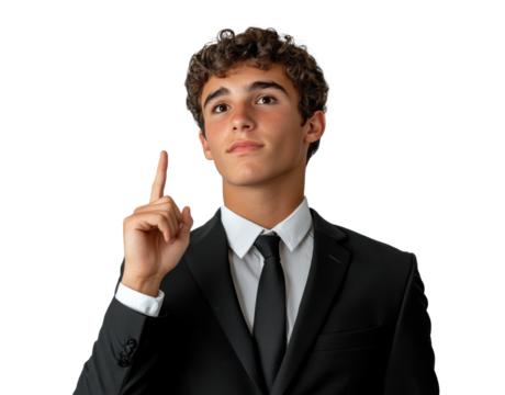 Young man in a black suit gestures confidently while pointing upwards in a neutral setting