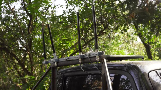 mobile electronic warfare system with antennas mounted on a military vehicle Designed to neutralize enemy drones and protect personnel Technology enhances mission success ensures the safety of soldier