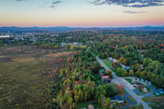 Tupper Lake NY Adirondacks Tri Lakes Region looking north Rt 30 fall aerial sunset