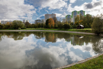 View of the Altufyevsky pond and residential buildings on the Altufyevsky highway. Lianozovo...