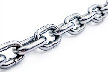 Fototapeta premium Angular perspective photograph of a taut steel chain with a close-up of a single link; natural blur bokeh is featured in the photo.
