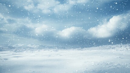 Winter storm approaching a snow-covered landscape with large blank space in the sky for copy
