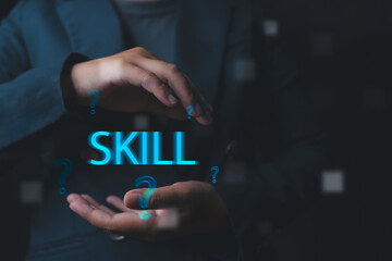 Businessman's hand shows a virtual screen displaying skill enhancement results, emphasizing the...