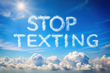 Stop Texting Icon Sign Against a Blue Sky with Clouds - Drone Photography for Safety Awareness