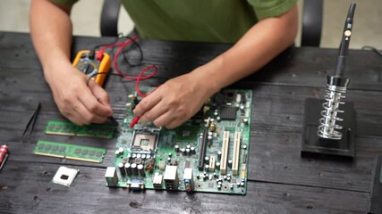 Engineer, a precise computer motherboard repair technician, uses a screwdriver to change parts, focuses on technology maintenance, repairs electronic devices, and supports ideas.