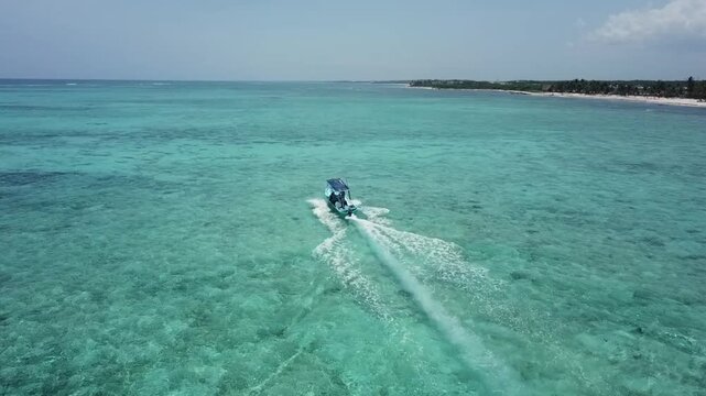 Aerial view of Boat ryding in Tankah Bay, Tulum, Mexican Caribbean