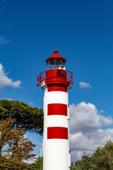 Red and white striped iron lighthouse in La Rochelle, Charente-Maritime, France, Europe