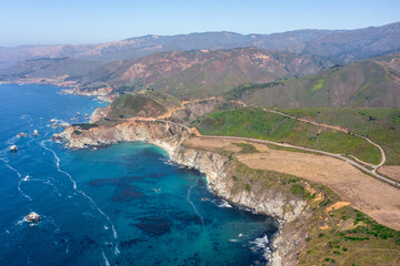 Beautiful landscape of Pacific Ocean coast along Highway 1 and Big Sur, aerial view, sunset, sunrise, fog. Concept, travel, vacation, weekend