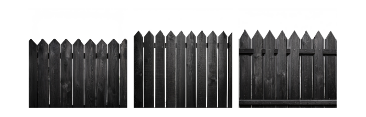 A black wooden fence with pointed tops.