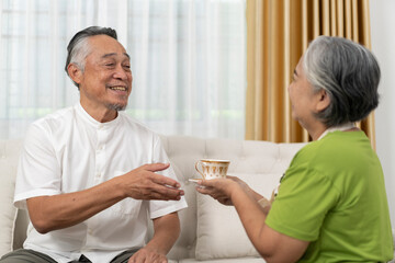 Senior Couple Sharing a Warm Moment with Coffee