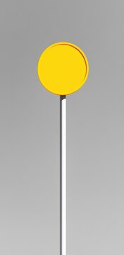 Bright yellow traffic sign on gray background