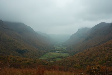 Obraz premium Snowdonia Valley With Autumn Foliage And Overcast Sky