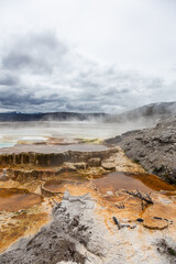 Breathtaking Landscape of Geothermal Hot Springs in Yellowstone National Park on a Cloudy Day in Wyoming, USA