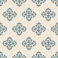 Elegant seamless damask pattern in muted blue on a beige background, featuring classic ornamental floral designs. Perfect for wallpaper, textiles, and interior decor with a vintage touch.