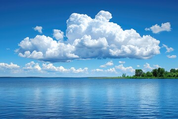 Expansive Blue Sky with Puffy Clouds Over a Still Lake