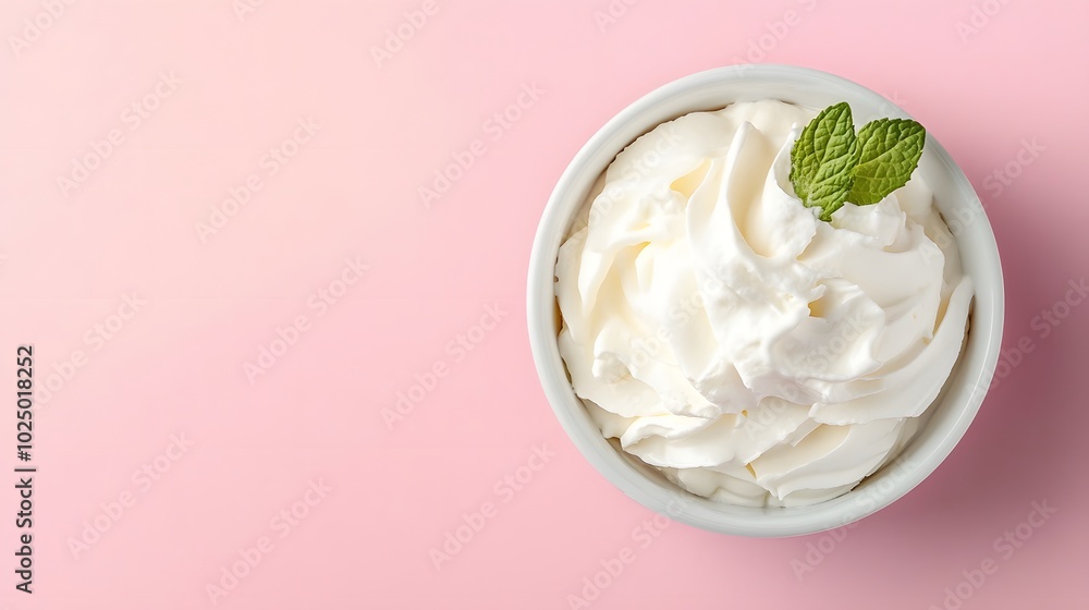 Poster 1. a top-down view of a bowl of creamy sour cream placed on a soft pastel background, creating a cle