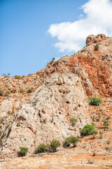 Scenic view of natural red rock cliffs formations