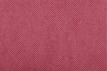 Red fabric cotton texture. Textile background fabric