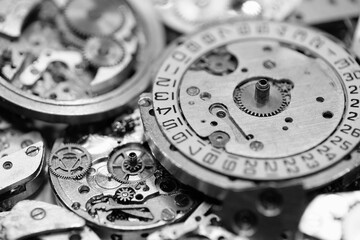 Old mechanical watches with gears and cogs. Watch or clock mechanisms