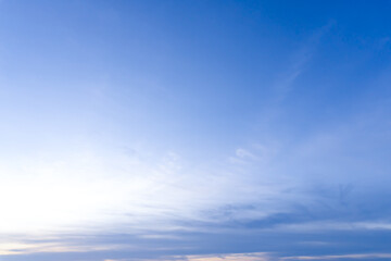 Beautiful morning or evening blue and orange sky while sunsets or sunrises taken at the sea used as natural blackground texture.