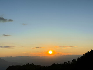 Majestic Sunset Over Mountain Range