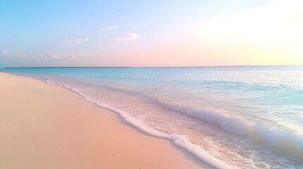 Obraz premium Serene Sunset at Tropical Beach - Gentle Breeze and Soft Waves Create a Peaceful Shoreline Scene Under Vibrant Skies