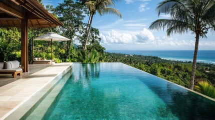 Infinity Pool Overlooking Tropical Ocean and Lush Foliage