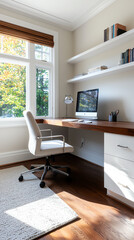 A front view of a small home office nook with a builtin desk, shelves, and a comfortable chair