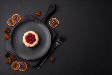Sweet mousse tart with raspberries and filling