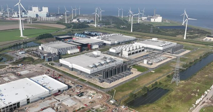 Large search engines company data center in the Eemshaven, Groningen, The Netherlands. Aerial droen video
