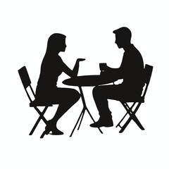 A young Caucasian man and woman sitting at a table, engaged in conversation