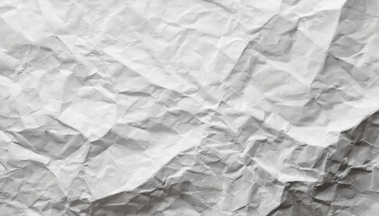 Crumpled white paper with textured surface showing depth and dimension in a bright, natural lighting setting