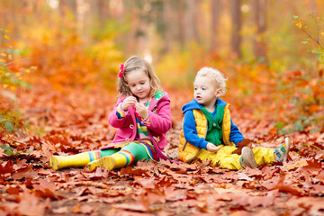 Kids playing in autumn park