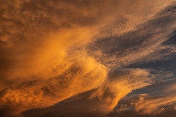Sunset sky with dramatic orange coulds