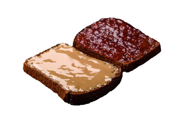 Sandwiches with toast bread, peanut butter and raspberry or strawberry jam